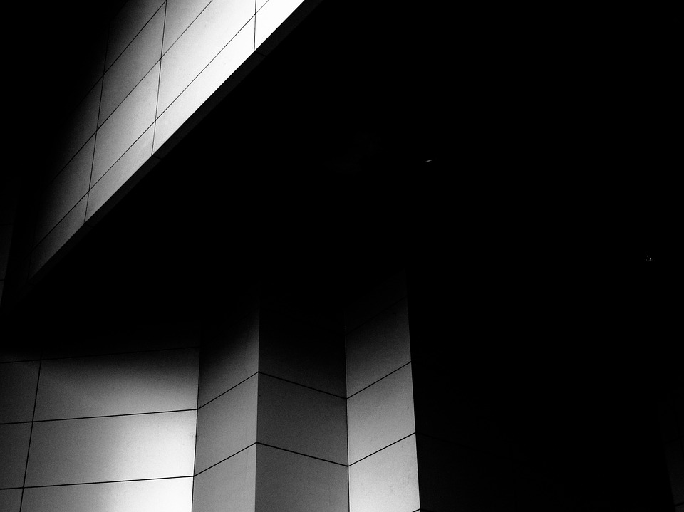 building walls in dark shadows
